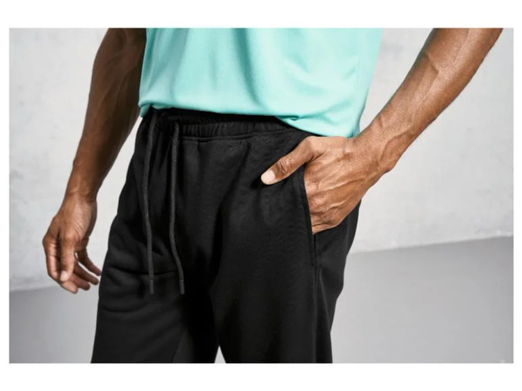 خرید اسلش مردانه کریویت Crivit رنگ مشکی، شلوار راحتی و ورزشی گرم با پارچه پشمی و الیاف نرم نمای جیب/صبامی