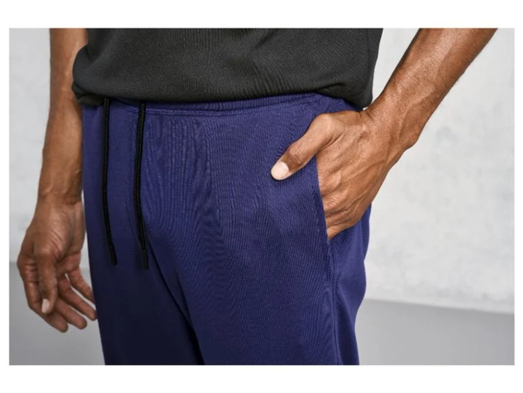 اسلش مردانه کریویت Crivit رنگ سورمهای روشن، شلوار راحتی و ورزشی گرم با پارچه پشمی و الیاف نرم نمای جیب | صبامی