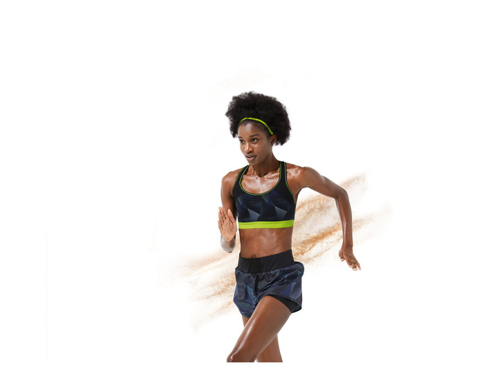 خرید نیمتنه ورزشی زنانه کریویت سبز فسفری با پد داخلی ثابت و طراحی پشت ضربدری نمای کامل