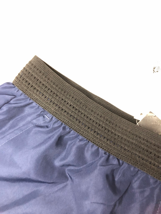 شلوارک ورزشی مردانه سرمهای برند Crivit آلمان با جیب زیپی و پارچه سبک و تنفسپذیر نمای کمر | صبامی