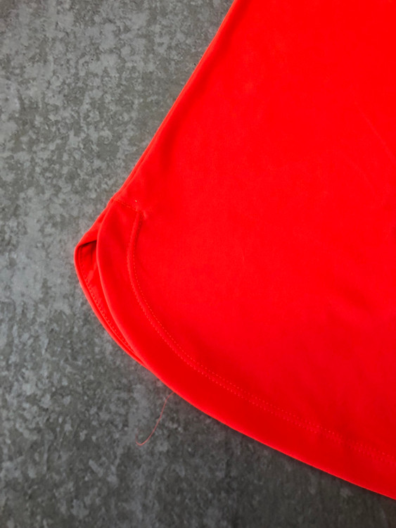 خرید تاپ زنانه ورزشی کریویت نارنجی پلی استر و الاستان نمای تن | صبامی