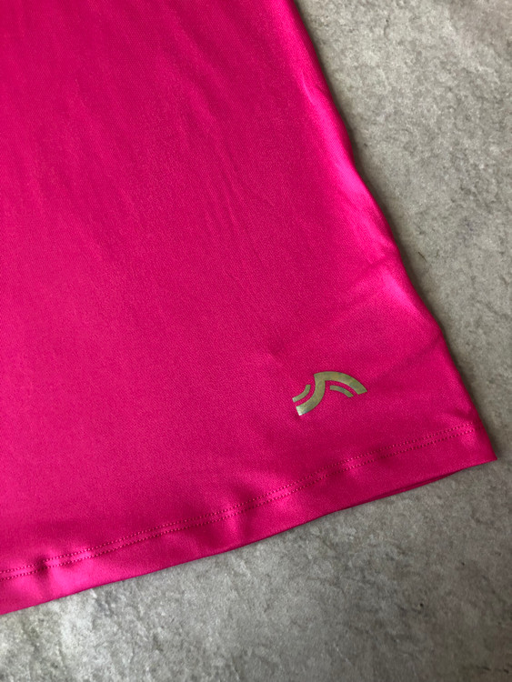 خرید تاپ زنانه ورزشی کریویت صورتی پلی استر و الاستان نمای مارک | صبامی