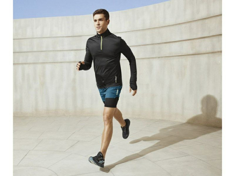 خرید شلوارک ورزشی مردانه کریویت (Crivit) آلمان – سبزآبی کشالهدار با آستر داخلی و زیپ YKK | نمای تنخور | صبامی